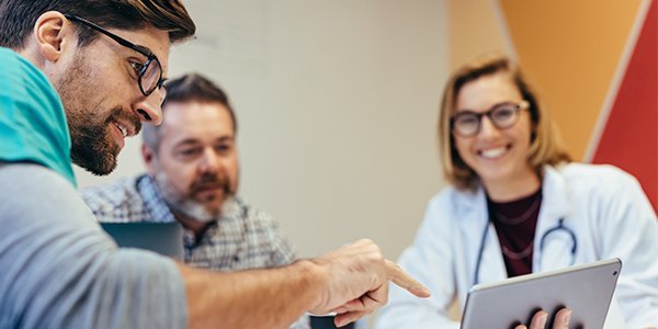 Man explaining something on a laptop